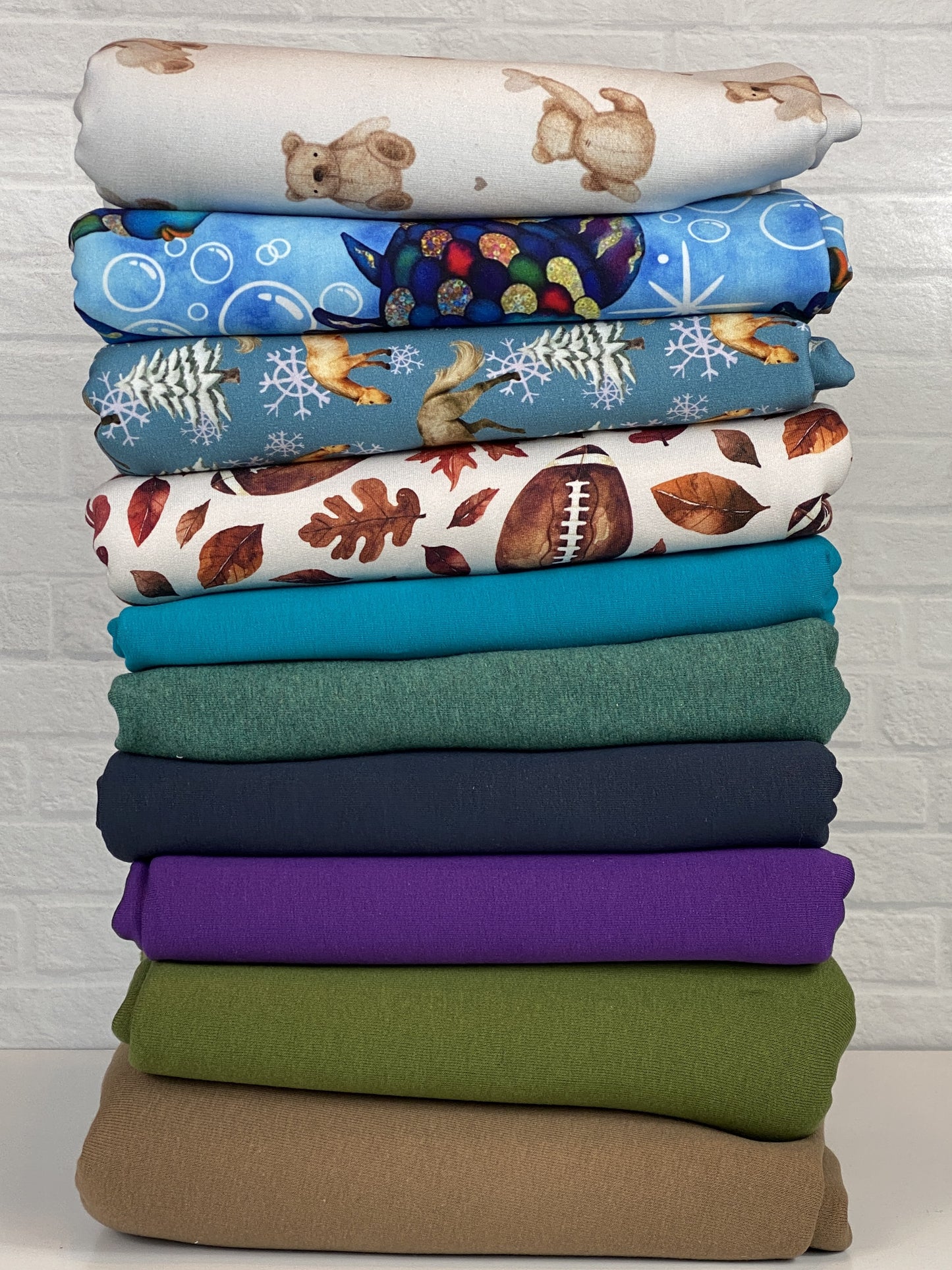 10 yard Fabric Bundle - Prints and Solids Bundle - European-Solids and Reactive-printed Prints - Cate and Rainn Football - Rainbow Fish (from book) - Winter Horses - Teddy w/gray hearts
